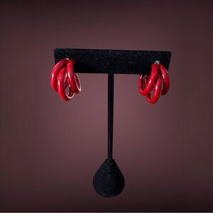 NWOT Vibrant red post back earrings.They have 3 loops together. Fun pop of color